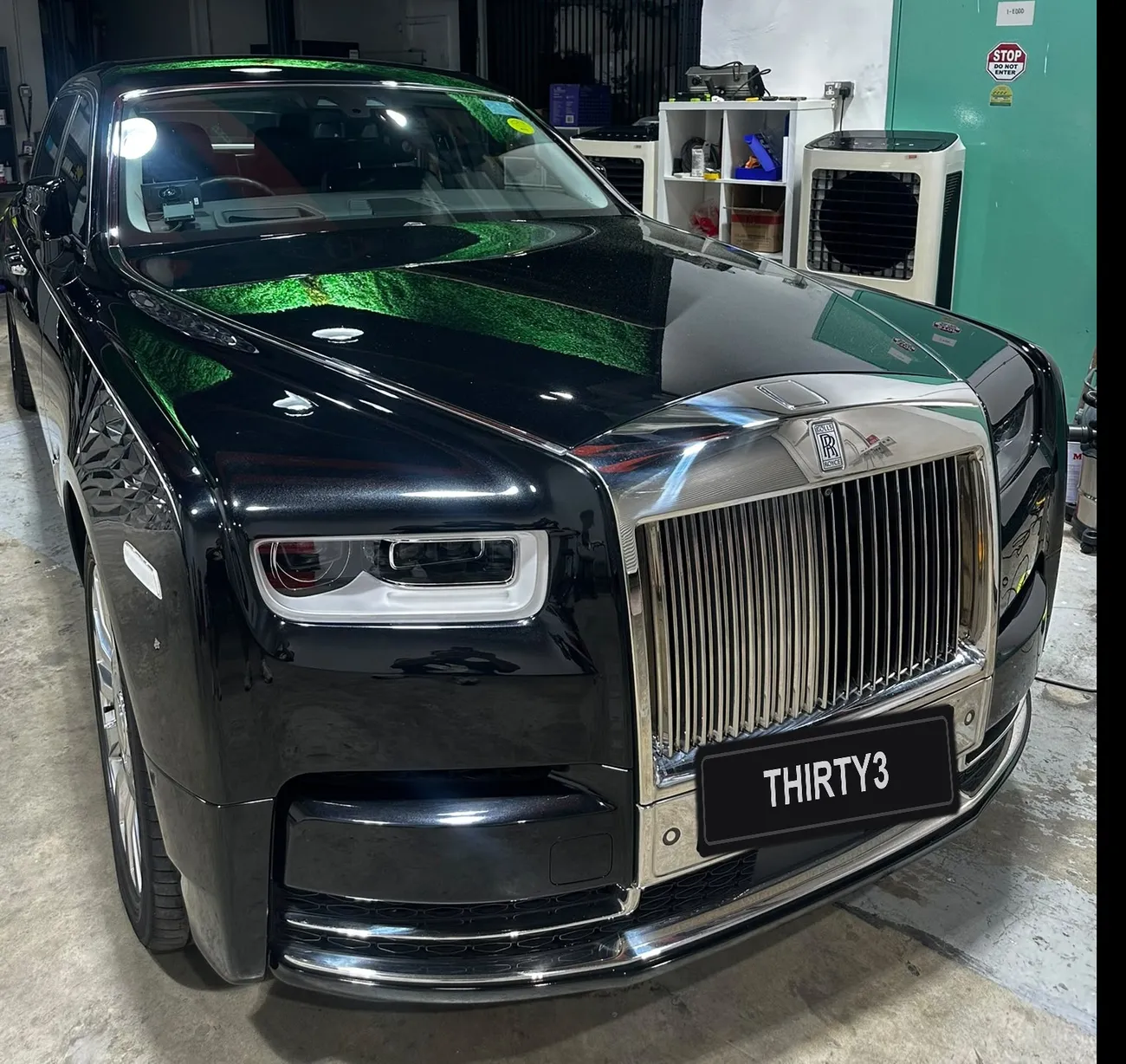 Rolls-Royce Phantom with a machine-polished, mirror-finish bonnet at the detailing studio