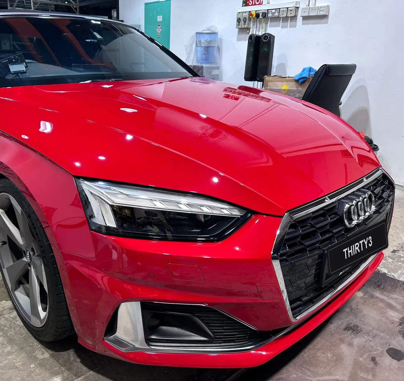 Audi with a machine-polished, mirror-finish bonnet at the detailing studio