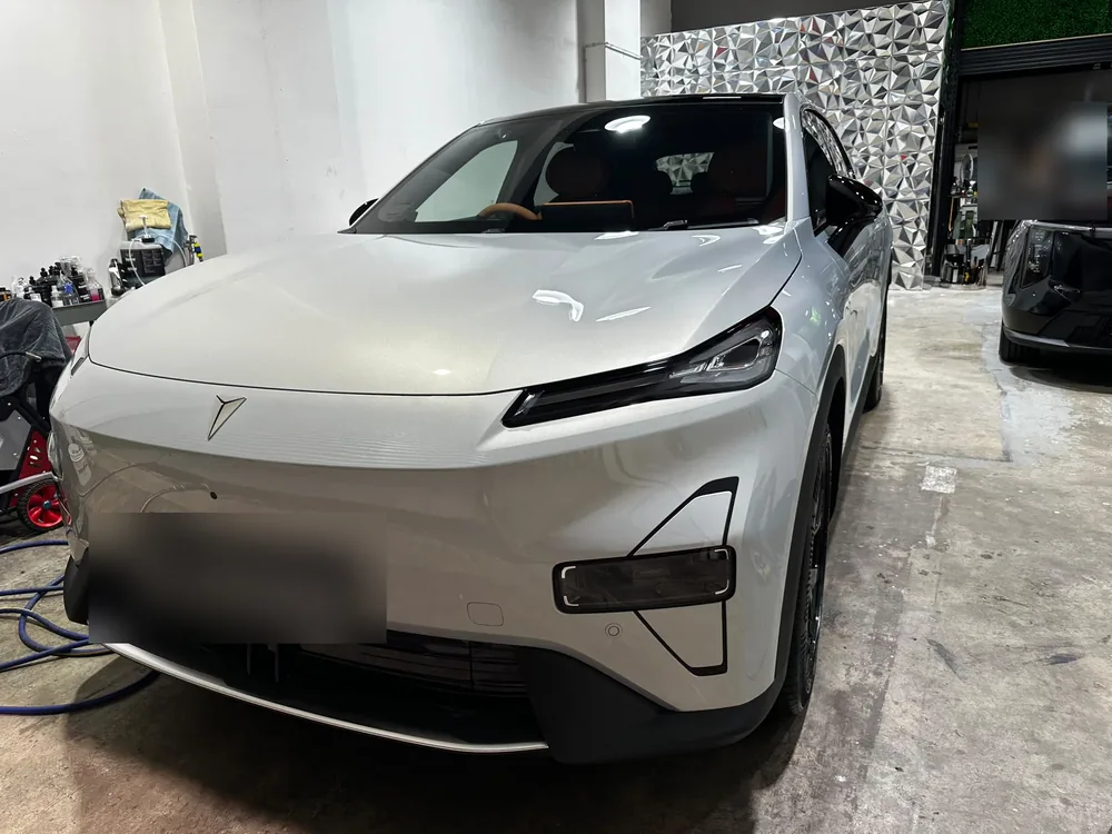 White electric SUV detailed at the Paya Ubi studio