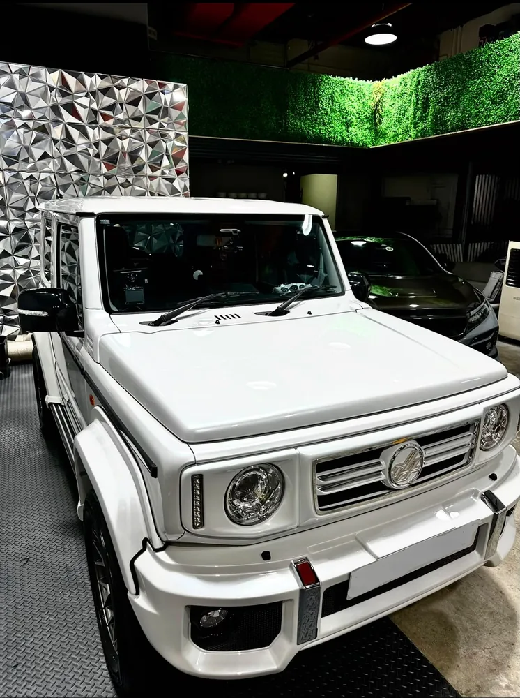White SUV polished and coated at the Paya Ubi studio