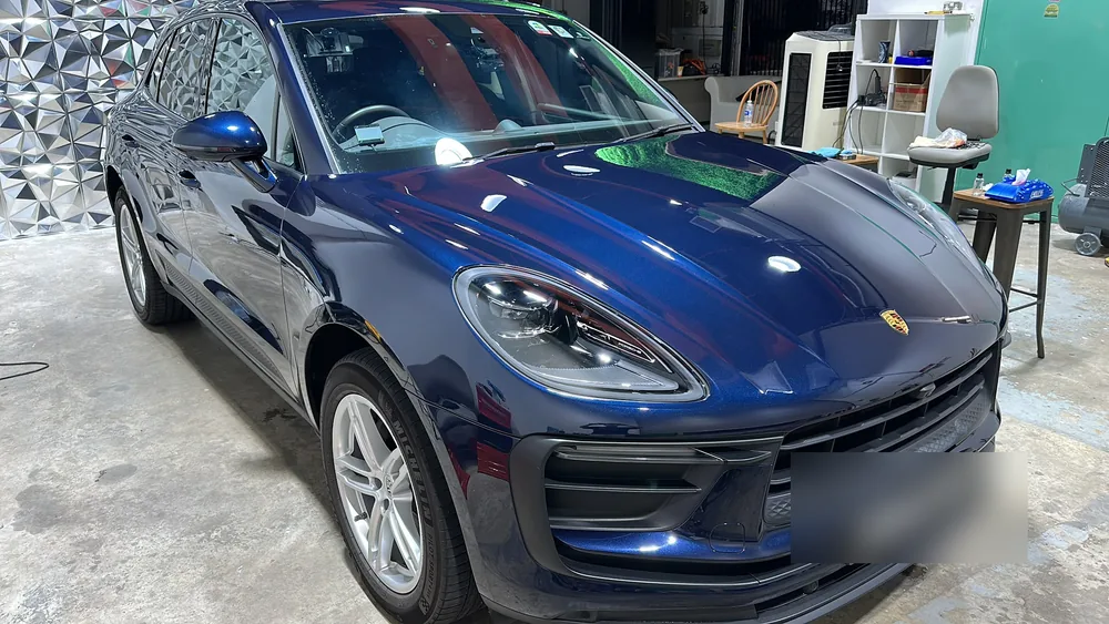 Blue Porsche Macan with a corrected, coated finish
